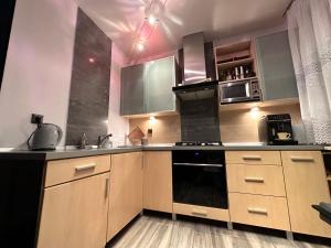Kuchnia lub aneks kuchenny w obiekcie Be Inn - Luxury Apartment Gliwice