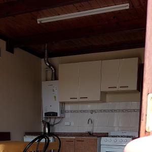 A cozinha ou cozinha compacta de Cabañas Oyikil