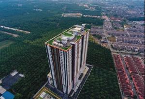 uma vista superior de um edifício alto numa cidade em 休闲民宿 Leisure Homestay @The Venus Sitiawan em Kampong Lumut Kiri