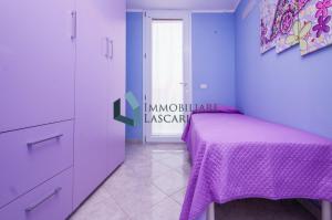 Posteľ alebo postele v izbe v ubytovaní Villa Luana, a pochi passi dal mare