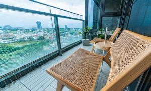 Balkonas arba terasa apgyvendinimo įstaigoje 漫遊小旅泳池溫泉宅 Roaming Travel Hot Spring Homestay