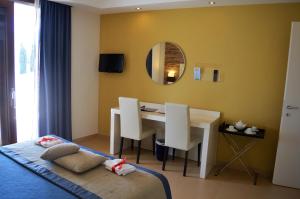 Postel nebo postele na pokoji v ubytování Prince Franklyn Hotel