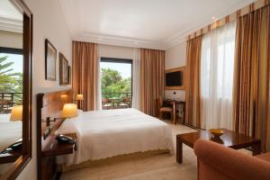 Postel nebo postele na pokoji v ubytování Villa VIK - Hotel Boutique + 34 fotografií