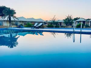 Bazén v ubytování Heritage Juma Resort with swimming pool nebo v jeho okolí