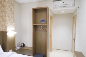 Postel nebo postele na pokoji v ubytování Yokotel Hotel