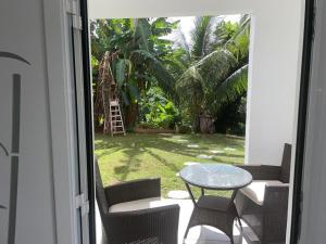 Zahrada ubytování Bel appartement dans écrin de verdure