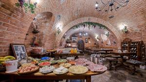 a room with a bunch of food on a table at Chaty ve Ski-relax Avalanche Dolní Moravice in Dolní Moravice