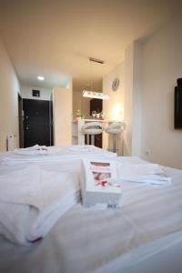 Postel nebo postele na pokoji v ubytování Apartman Lux