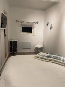 Postel nebo postele na pokoji v ubytování Small cozy apartment
