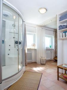 a bathroom with a shower in a room at Pension Kilger in Mauth