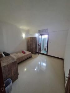 Posezení v ubytování Villa Palmira 6 suites avec piscine 5 min à pied de la plage Pereybere