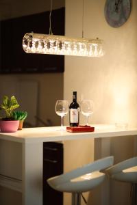 Kuchyň nebo kuchyňský kout v ubytování Apartman Lux