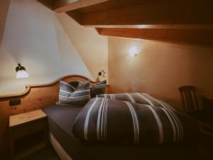 Ein Bett oder Betten in einem Zimmer der Unterkunft Appartamenti Lumaca
