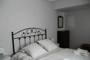 A bed or beds in a room at Piso céntrico ideal