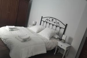 A bed or beds in a room at Piso céntrico ideal