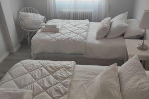 A bed or beds in a room at Piso céntrico ideal