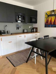 Kuchyň nebo kuchyňský kout v ubytování BOTKa apartmán, Tatranská Štrba