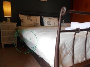 Posteľ alebo postele v izbe v ubytovaní Secret Garden 76 sq.m. apartment close to city center