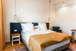 Letto o letti in una camera di Hanul cu Sălcii