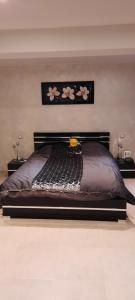 Posteľ alebo postele v izbe v ubytovaní Loft atypique et chaleureux + 1 fotografia