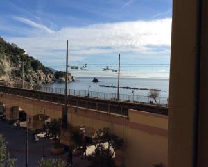 a view of the ocean from a building at Il Portico in Monterosso al Mare