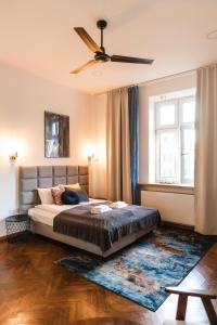 Posteľ alebo postele v izbe v ubytovaní Vilao Apartments