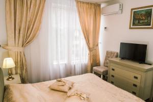 Łóżko lub łóżka w pokoju w obiekcie HOTEL CORA Bistrita