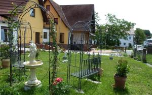 a statue in the yard of a house at An der Uferpromenade in Worbis