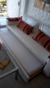 A bed or beds in a room at Edificio Mediterraneo