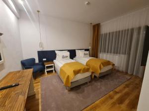 Letto o letti in una camera di Hanul cu Sălcii