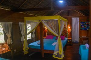 Cama ou camas em um quarto em Ciamat Camp
