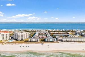 an aerial view of the beach and buildings at Villas on the Gulf H10 in Pensacola Beach