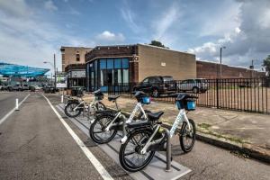 a row of bikes parked in a parking lot at Private Historic Studio in Memphis