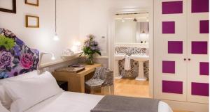 Postel nebo postele na pokoji v ubytování Cinque Rooms