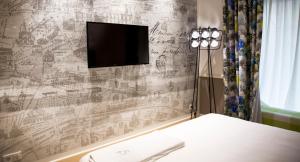 Postel nebo postele na pokoji v ubytování Cinque Rooms