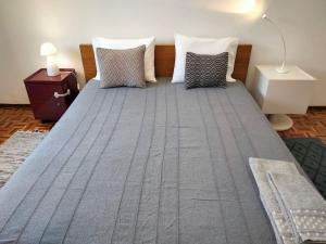 Postel nebo postele na pokoji v ubytování Casa Laranjeira