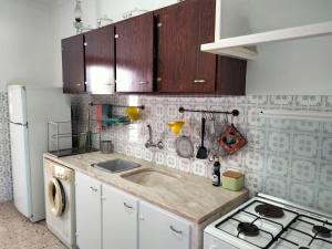 Kuchyň nebo kuchyňský kout v ubytování Casa Laranjeira