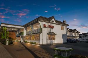 a rendering of the front of a hotel at SureStay Hotel by Best Western North Vancouver Capilano in North Vancouver