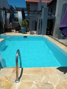 Πισίνα στο ή κοντά στο Casa Confortável