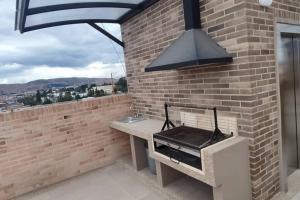 Barbacoa disponible para clientes en el apartamento