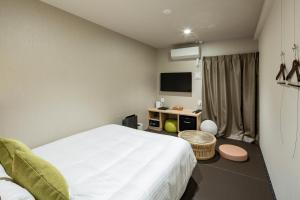 TV a/nebo společenská místnost v ubytování Hotel Reference Tenjin III
