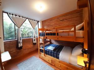 Postel nebo postele na pokoji v ubytování SIERRA VERDE-casa vacacional + 18 fotografií