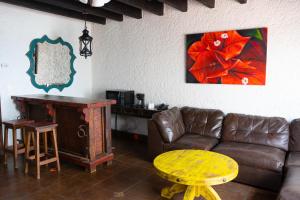 Posezení v ubytování Las Rocas Resort & Spa