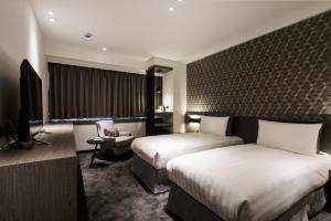 Postelja oz. postelje v sobi nastanitve Wonstar Hotel