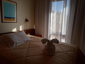 Cama o camas de una habitación en Residencial Pousada do Serrano