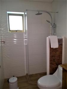 Ein Badezimmer in der Unterkunft EL RINCON DE LÚ