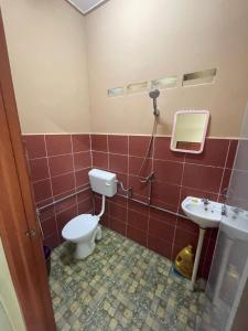 Koupelna v ubytování Ikhlas Roomstay