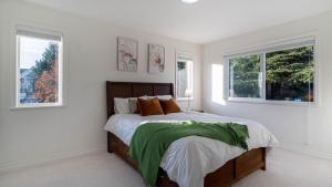 Letto o letti in una camera di 温西区豪华别墅附有按摩浴缸钢琴，接近机场downtown