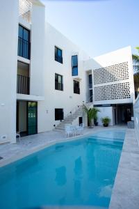 Bazén v ubytování La Casona de Sisal Hotel nebo v jeho okolí
