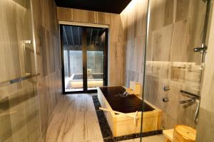 Koupelna v ubytování Tokachigawa Moor Onsen Seijyakubow